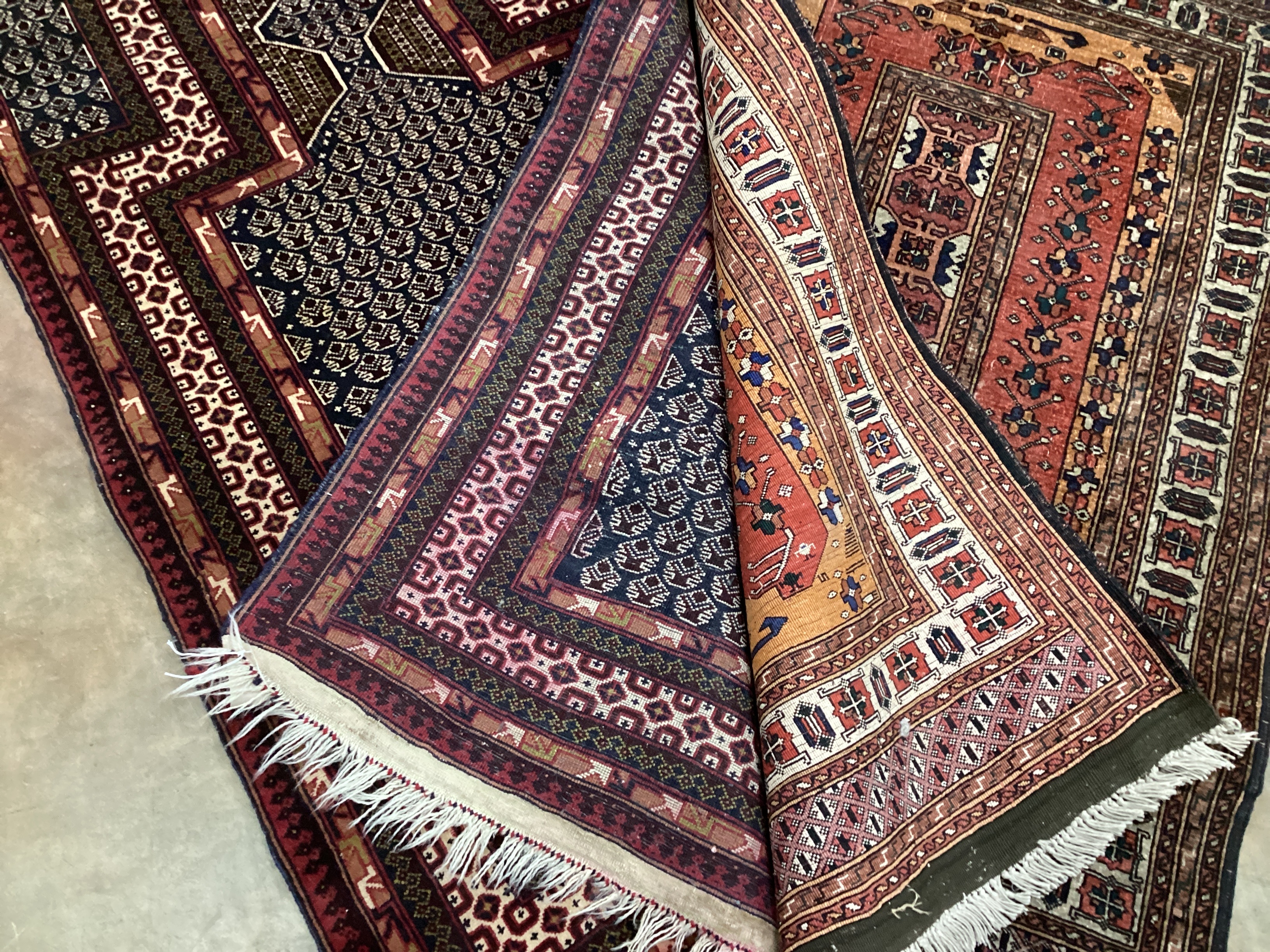 A North West Persian prayer rug, 140 x 85cm, and a small red ground rug, 132 x 85cm